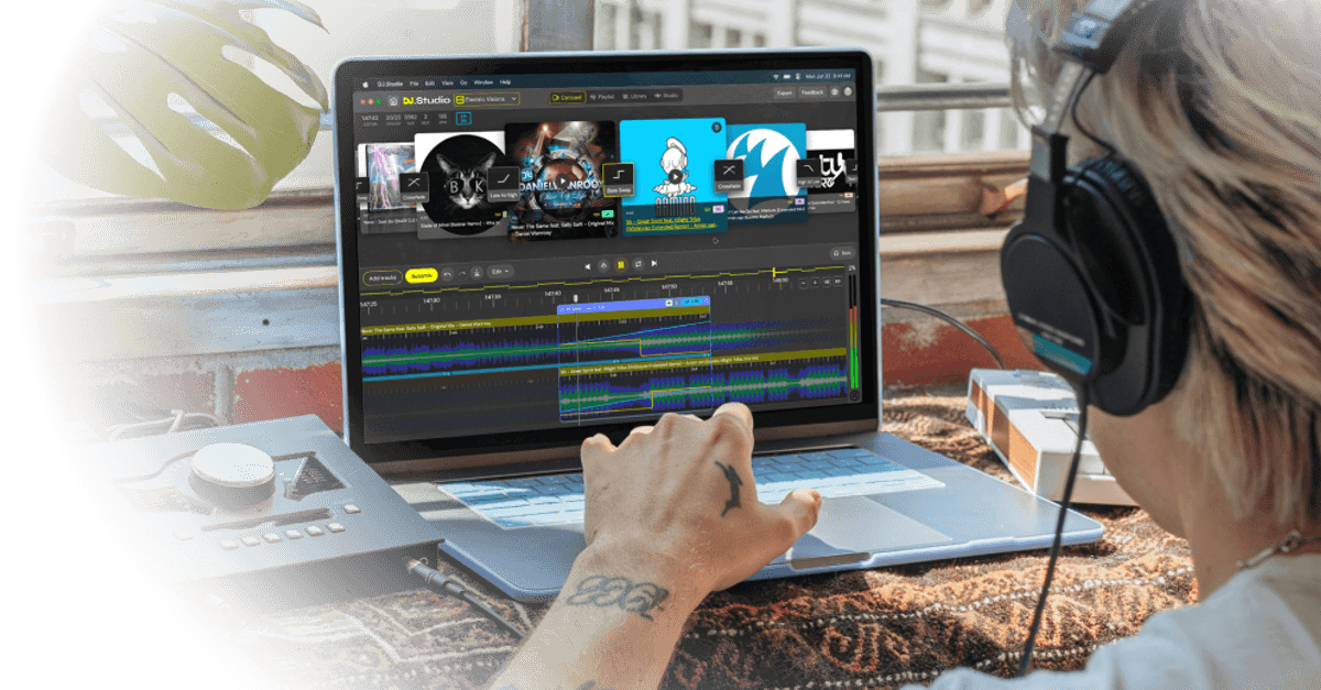 DJ working on his laptop with the DJ.Studio carousel tab open